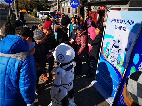 中(zhōng)國民主法制出版社聯合社科院法學所、國際法所等單位開展“12·4”國家憲法日宣傳活動